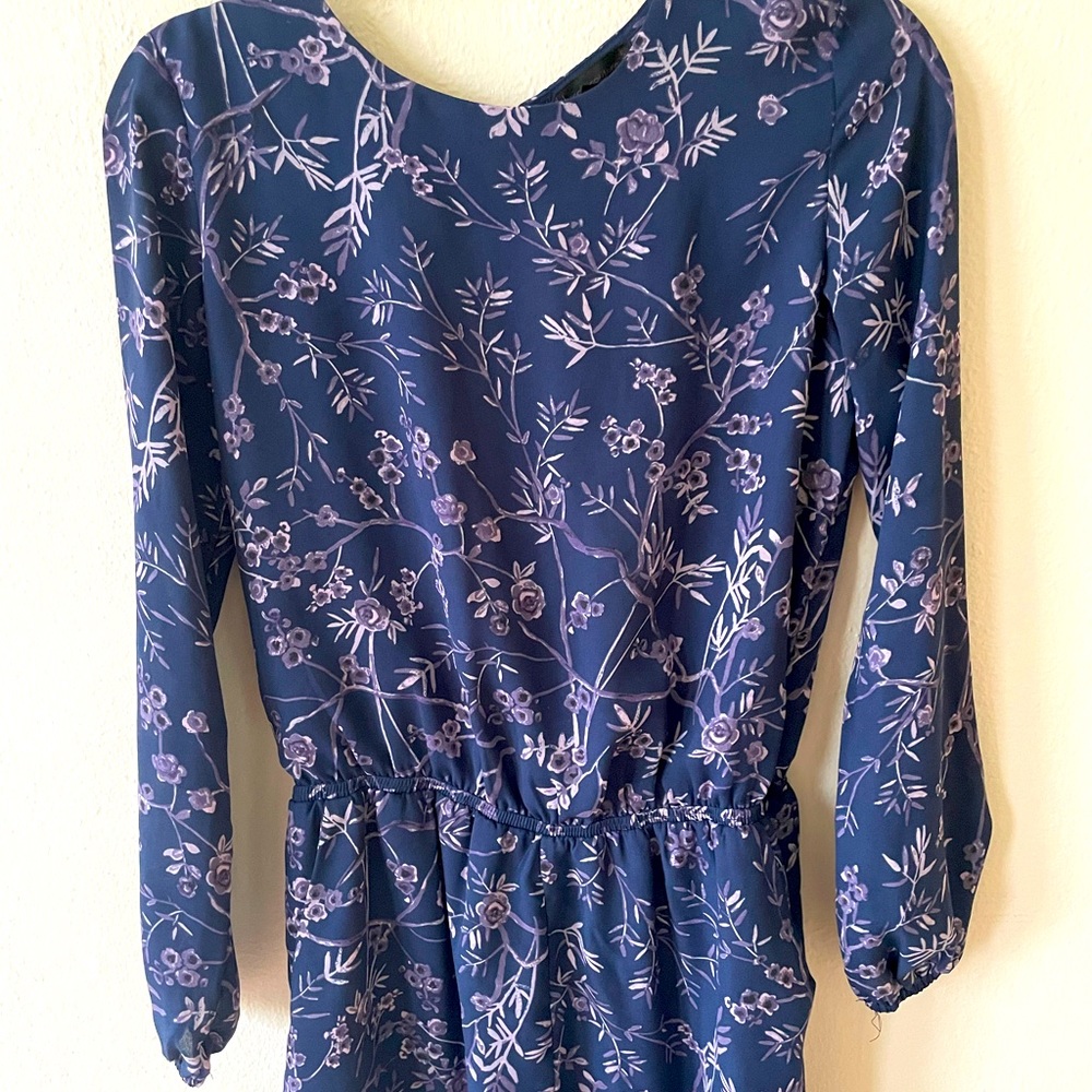 Romper with pockets and open back